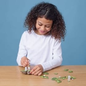 Girl constructing a Eugy - Tricera