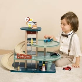 Child Playing with the Vintage Garage