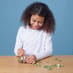 Girl constructing a Eugy - Tricera