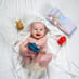 Child Enjoying the Bath-time Essentials Kit